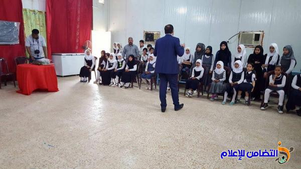 بالصور :: مدرسة التضامن الأولى للأيتام في الناصرية  تقيم معرضا للرسوم بالتعاون مع صحة ذي قار