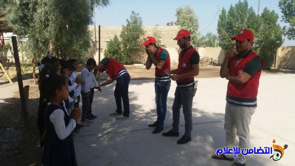الهلال الأحمر العراقي تقيم محاضرة صحية توعوية لتلاميذ مبرة التضامن في الجبايش - مصور -