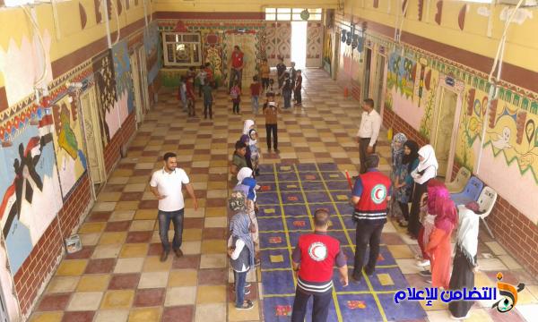 الصليب الأحمر العراقي يقوم بعدة نشاطات توعوية لتلاميذ مبرة التضامن في الفضلية - مصور-‎