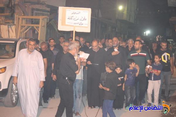 بالصور :موكب عـزاء جمعية التضامن الاسلامي يشارك بالمسيرة العاشورائية  في الليلة العاشرة وسط الناصرية 