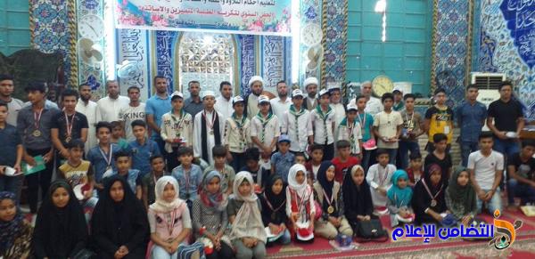 ذي قار: مدارس الإمام الصادق تحتفل بختام دوراتها الصيفية القرآنية - مصور-‎